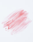 Rose Lip Butter in a soft pink shade, providing hydration and a hint of color for lips.